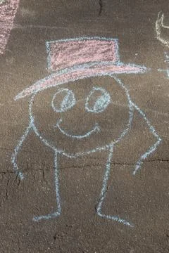 Drawing with chalk on asphalt Stock Photos