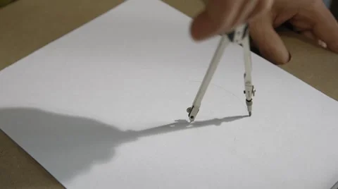 Drawing a circle with a compass close up Stock Footage 45429945