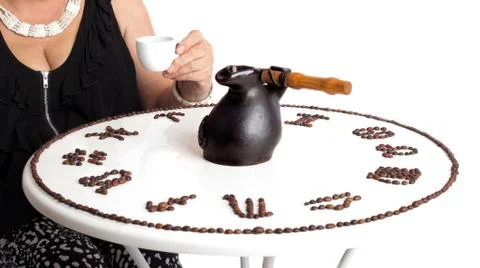 Drawing of coffee beans on a table isolated on a white backgroun Stock Photos