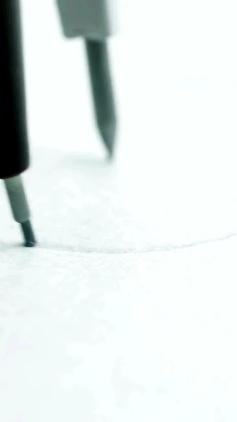 Drawing compass creates a perfect circle on white paper Video stock 331992074