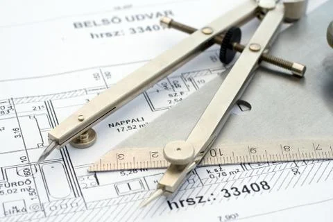 Drawing compass on a floor plan Stock Photos