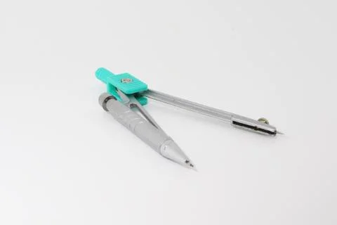 Drawing compass on white background Stock Photos