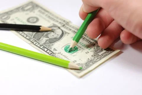 Drawing a counterfeit bill Man drawing a counterfeit bill. ,model released... Stock Photos