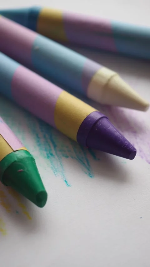 Drawing with crayons on paper Stock Footage 339997958