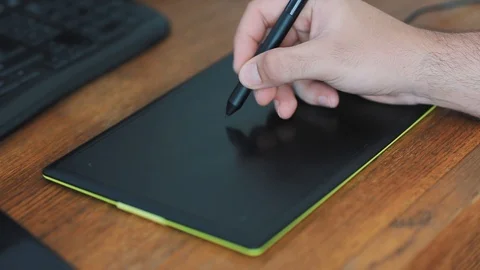 Drawing on a digital tablet with pencil Stock Footage 111972079