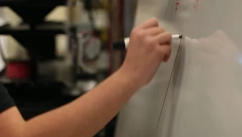 Drawing equation on whiteboard Stock Footage 10715508