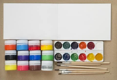 Drawing equipment on cardboad Stock Photos