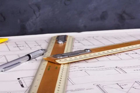 Drawing equipment on plans for making a model aircraft Stock Photos