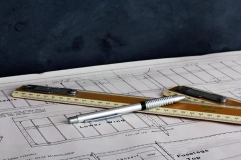 Drawing equipment on plans for making a model aircraft Stock Photos