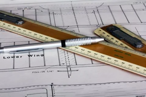 Drawing equipment on plans for making a model aircraft Stock Photos