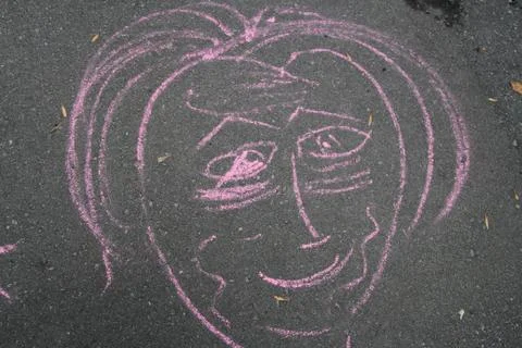 Drawing of a face shape in  pink chalk Stock Photos