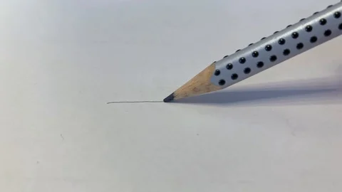 Drawing a freehand line on a white sheet of paper Stock Footage 110839961