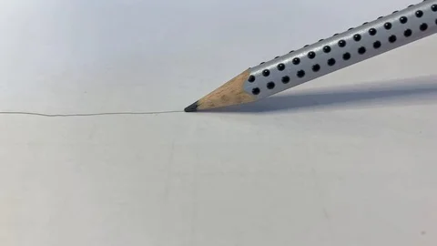 Drawing a freehand line on a white sheet of paper 2 Stock Footage 110840137