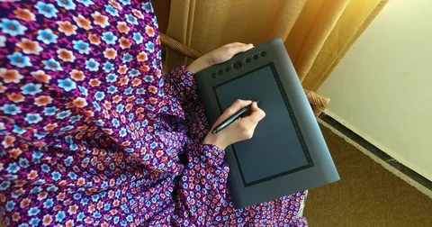 Drawing on a graphic tablet, at home. Stock Footage 76892809