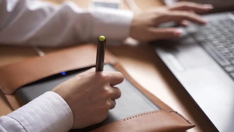 Drawing on a graphics tablet Stock Footage 129612292