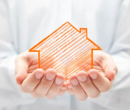 Drawing house in hands Stock-Fotos