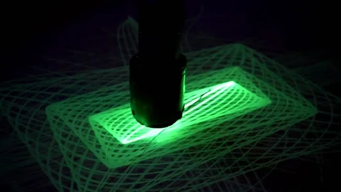Drawing Laser pendulum, light show on phosphorus surface, physics science Stock Footage 194799376