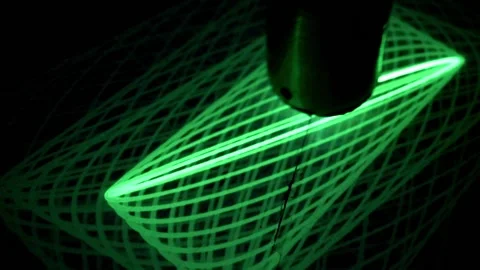 Drawing Laser pendulum, light show on phosphorus surface, physics science Stock Footage 194799406