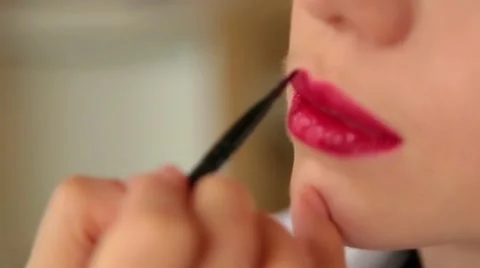 Drawing lip.  painting lips red lipstick Stock Footage 64258689
