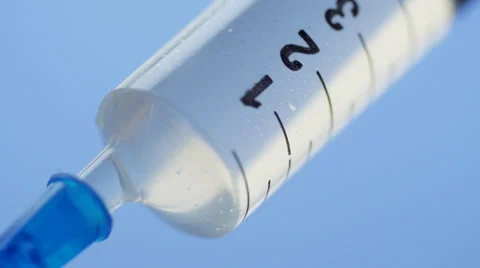 Drawing liquid in syringe CU Видео 29084151