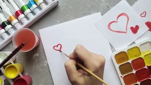 Drawing a little red heart  Stock Footage 147052175