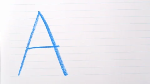 Drawing a lower case A with a blue colouring pencil Stock Footage 115670604