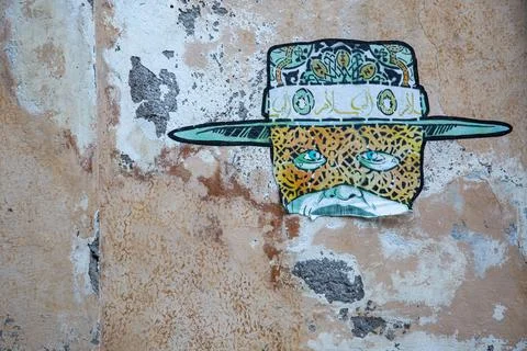 A drawing of a man with a hat on it Stock Photos