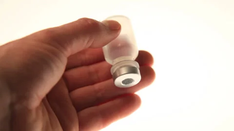 Drawing a medication from a vial with a syringe Video stock 32243666