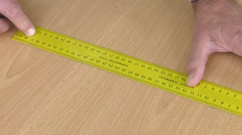 Drawing a melamine panel with a square and a pencil Video stock 63505707