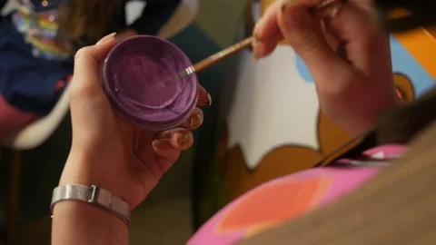 Drawing with paints. Brush in paint Stock Footage 125924966