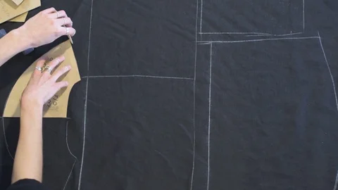 Drawing Pattern with Chalk on Fabric Stock Footage 104811396