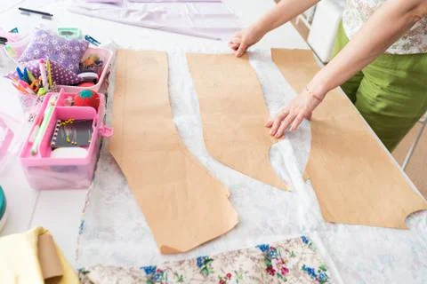 Drawing of pattern for cutting clothes from blue fabric. Stock Photos