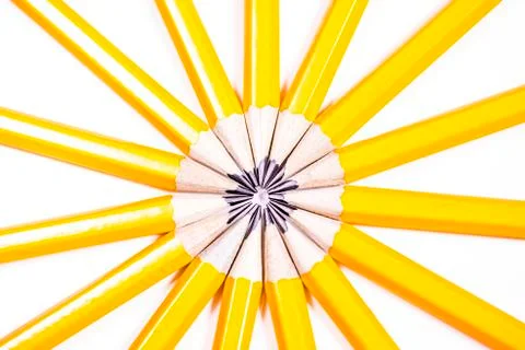 Drawing pencils arranged in a circle creating an abstract sunshine Stock Photos