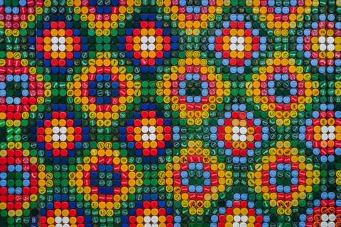 Drawing of Plastic Caps. Combination of Rhombus Patterns. Caps Laid out in Me Stock Photos