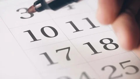 Drawing red circled mark on the tenth 10 day of a month in the calendar Stock Footage 107066903