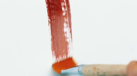 Drawing a red stroke with a brush Stock Footage 54670597