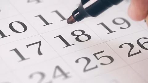 Drawing reminder mark on the eighteenth 18 day of a month Stock Footage 107426389