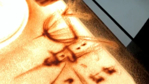 Drawing with sand. Drawing sand on a screen. Sand Artist. Hands draws. Animation Stock Footage 89714942