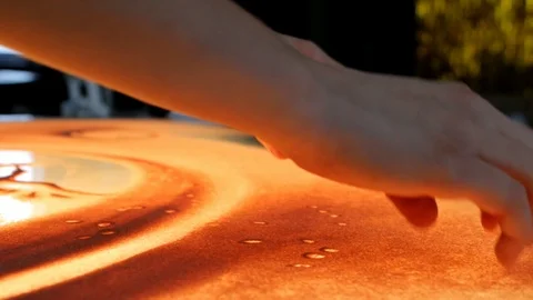 Drawing with sand. Drawing sand on a screen. Sand Artist. Hands draws. Animation Stock Footage 89715037