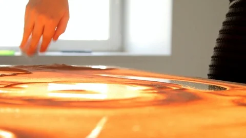 Drawing with sand. Drawing sand on a screen. Sand Artist. Hands draws. Animation Stock Footage 89754445