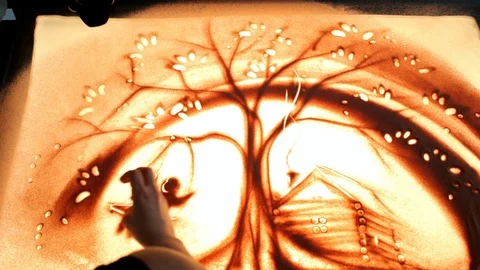 Drawing with sand. Drawing sand on a screen. Sand Artist. Hands draws. Animation Stock Footage 89754994