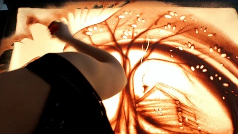 Drawing with sand. Drawing sand on a screen. Sand Artist. Hands draws. Animation Stock Footage 89755140