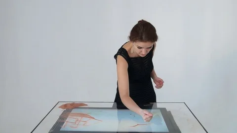 Drawing with sand. Drawing sand on a screen. Sand Artist. Hands draws. Animation Stock Footage 89897945