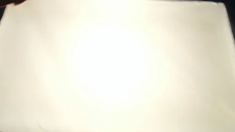 Drawing with sand. Drawing sand on a white screen. Sand Artist. Hands draws Stock Footage 89613972