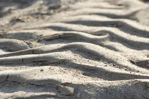 Drawing on a sandy beach at sunset, pattern , texture, background Stock Photos