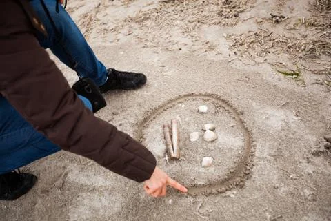 Drawing smile on the sand Foto stock