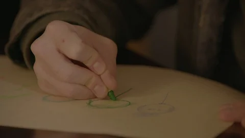 Drawing stick figures with crayon 3 Stock Footage 103864595