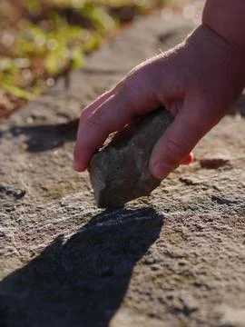 Drawing stone hand Stock Photos