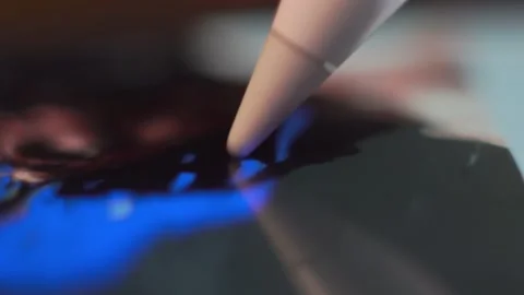 Drawing with a stylus pen on a tablet computer Stock Footage 205584921