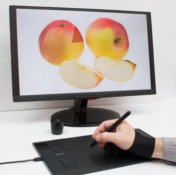 Drawing on the tablet Stock Photos